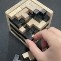 Dřevěný hlavolam KRUZZEL  3D kostka s T bloky