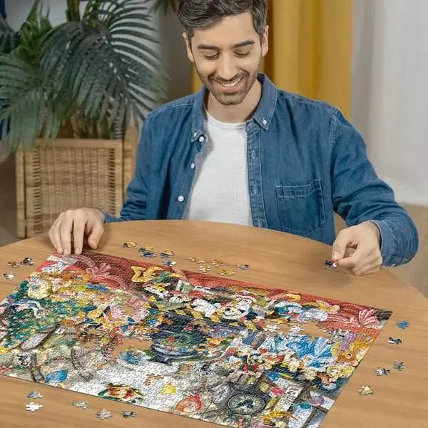 Puzzle Ravensburger 1000 dílků Disney: Všichni na palubě na Vánoce